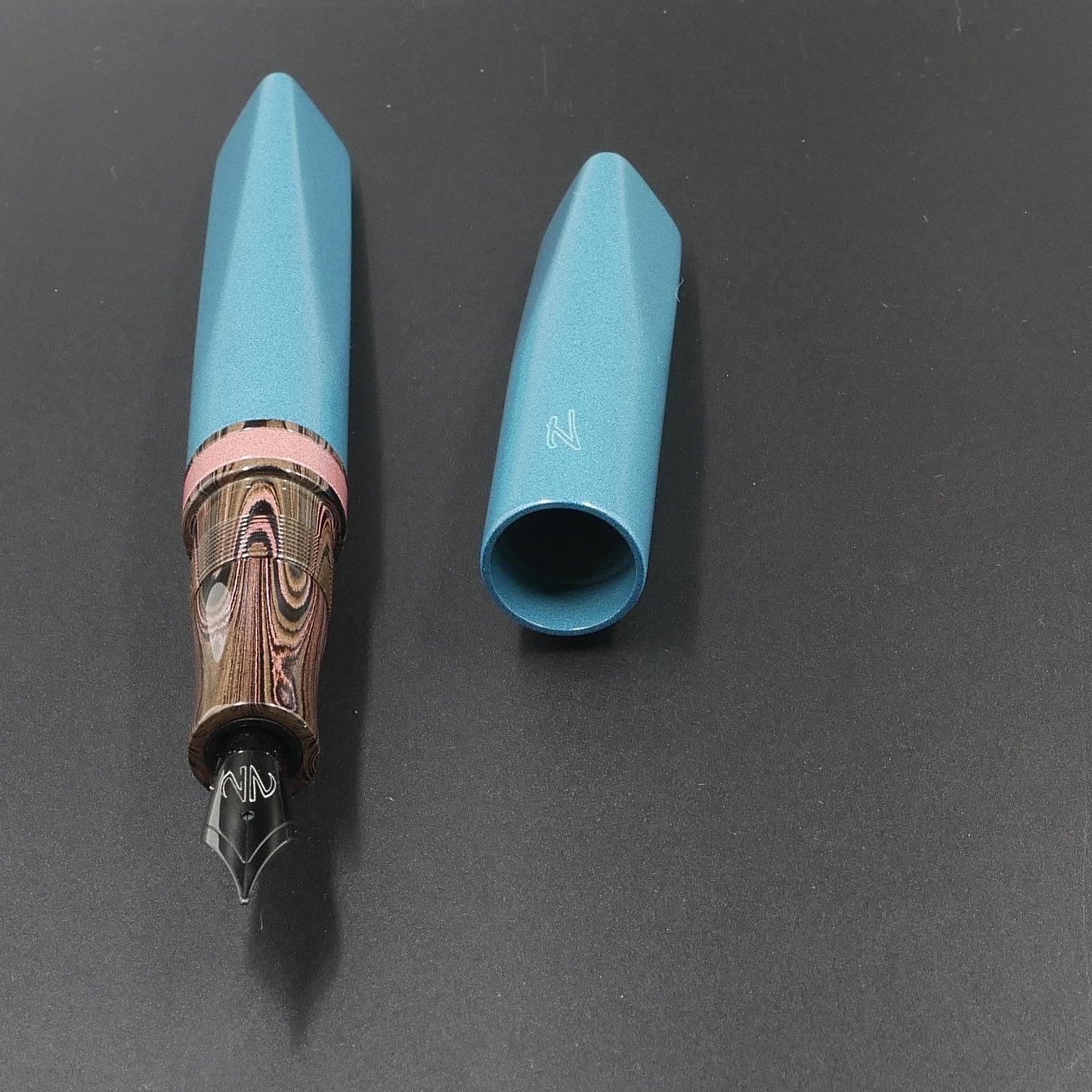 Prospector - Medium - Nikko Light Blue and Pink solid and ripple ebonites - Jowo #6 nib