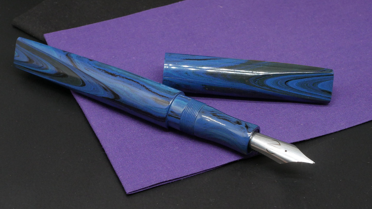 Prospector - Large – SEM Dark Blues ripple ebonite- #8 nib