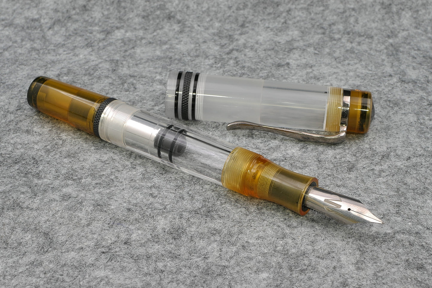 Knickerbocker - Large, Clear acrylic with natural and black ultem - piston fill - #8 nib