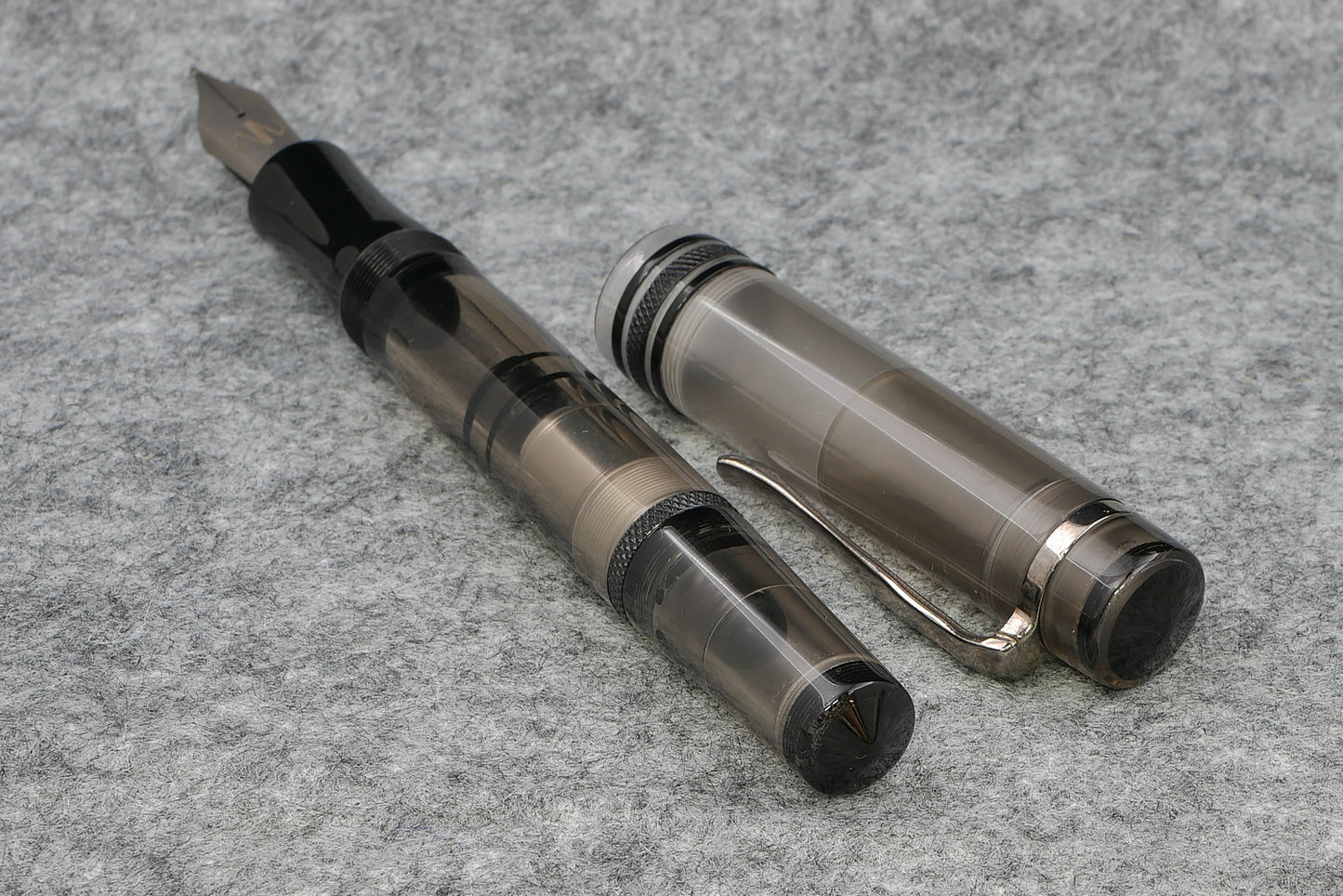 Knickerbocker - Large, Gray acrylic with black ultem - piston fill - #8 nib