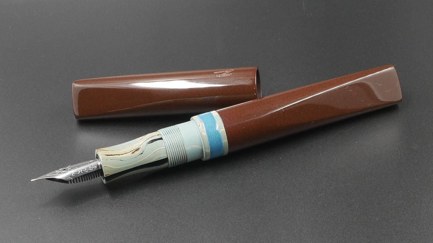 Prospector - Medium - Nikko Chocolate Brown and Light Blue, SEM Light Camo ebonites - Jowo #6 nib