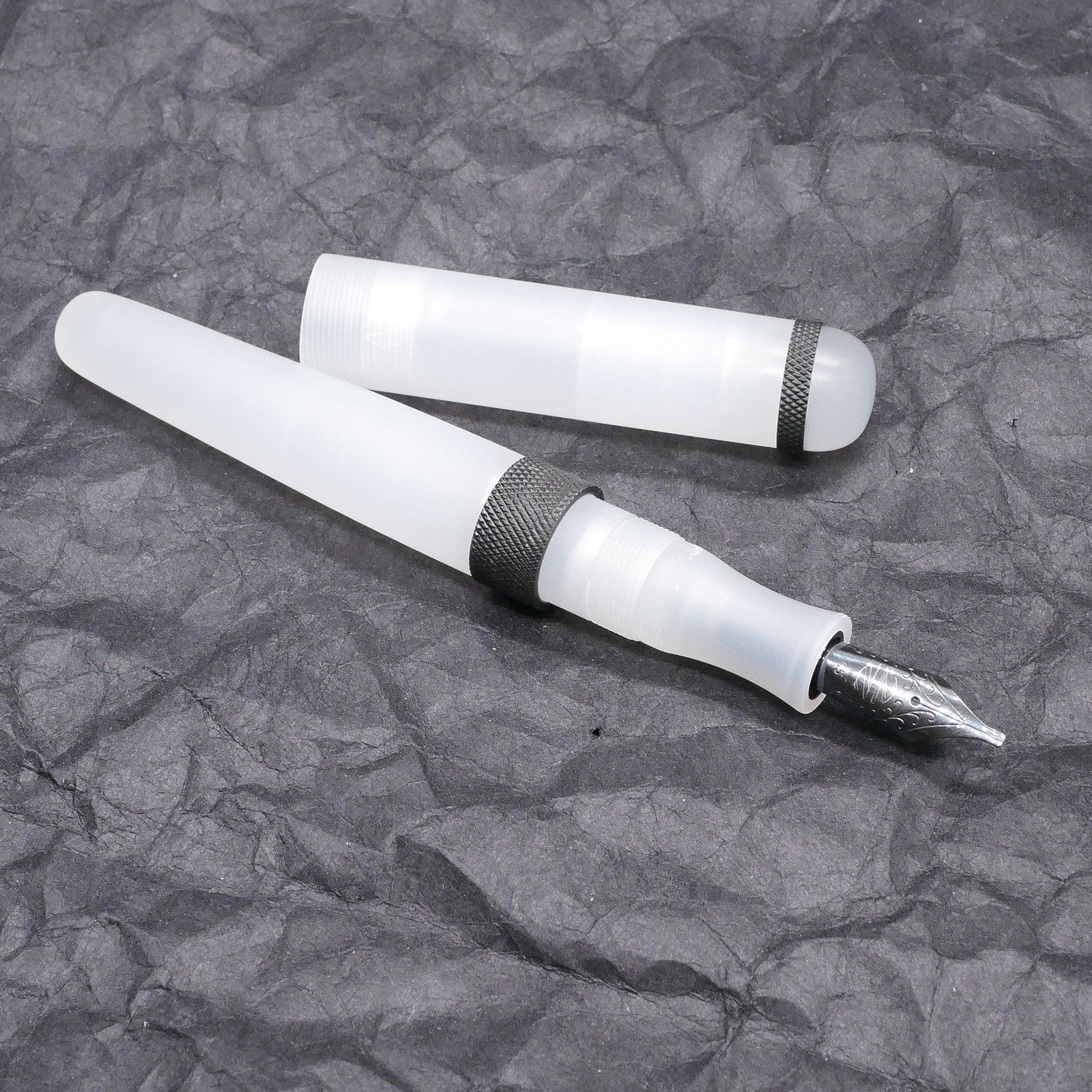 Majestic - Medium - Ghost white acrylic and black knurled rings - #6 nib