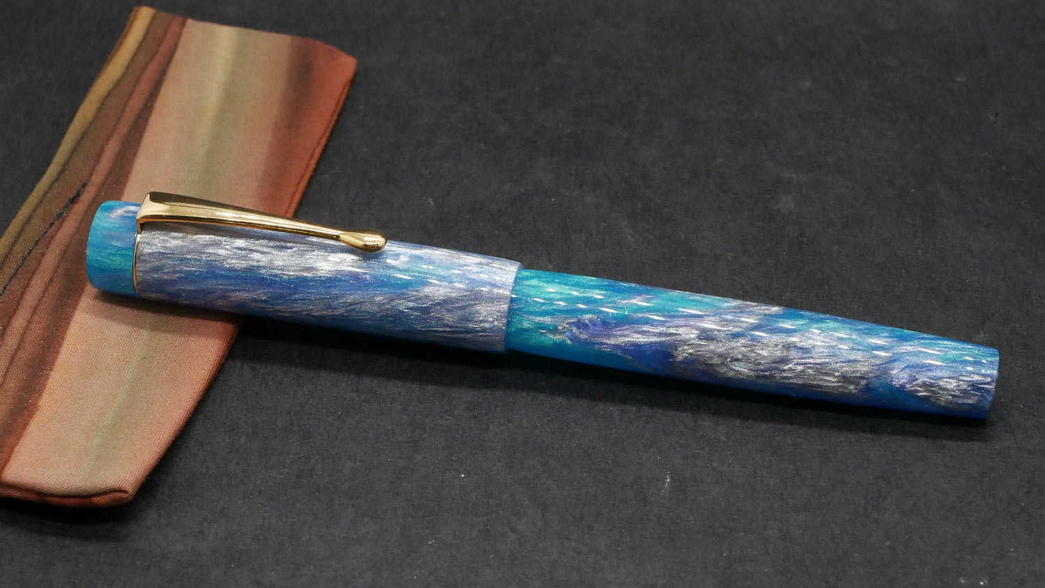 Orville - small - Motor City Pen Co Sky Blue resin  (traces of purple)- clip - #6 nib