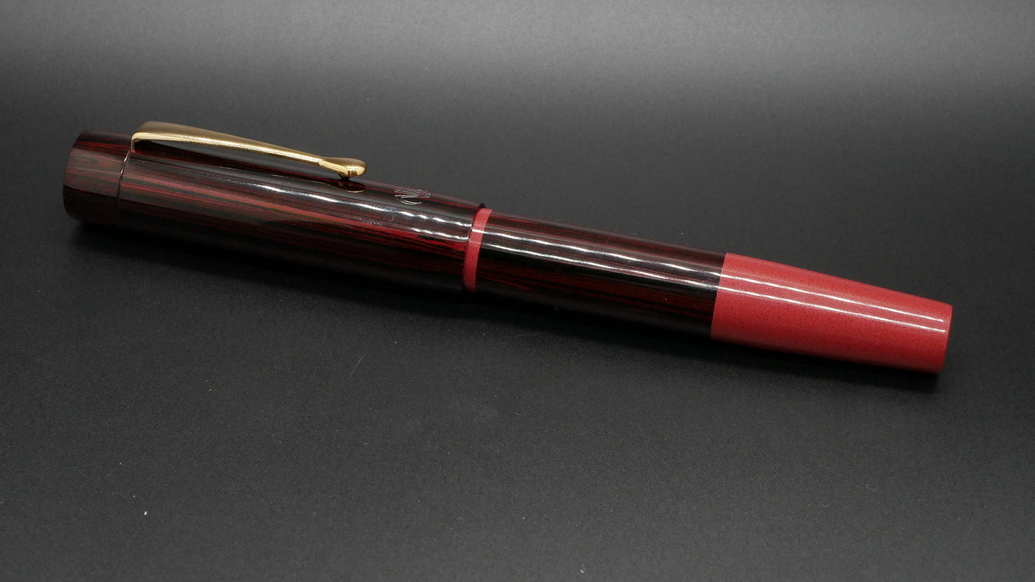 Orville - medium - Nikko Red and SEM Red ripple ebonite, doublet - clip - Jowo #6 nib