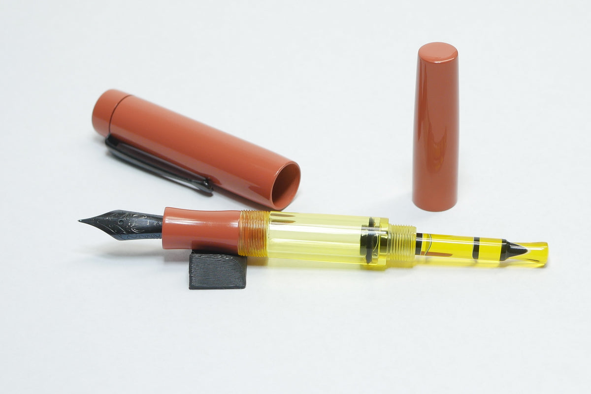 Orville - small - SEM Cumberland Orange ebonite - Jowo #6 - Syringe fill