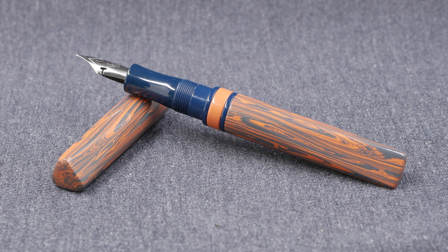 Prospector - Small - NYH Orange/blue gray ripple and blue ebonite - Jowo #6 nib