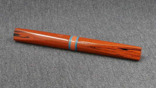 Prospector - Small - NYH orange woodgrain, blue and orange ebonites - Jowo #6 nib