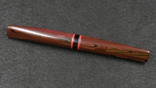 Prospector - Small - Nikko red ripple, solid red and black ebonite - Jowo #6 nib