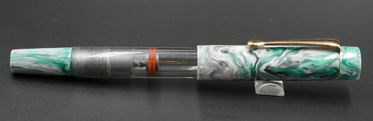 Orville - Small - Corrl Creatons Green Steel & clear gray acrylic - clip - piston - #6 nib