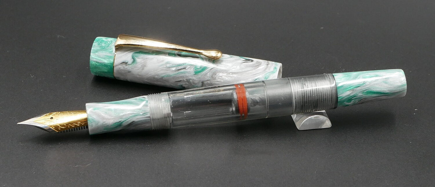 Orville - Small - Corrl Creatons Green Steel & clear gray acrylic - clip - piston - #6 nib