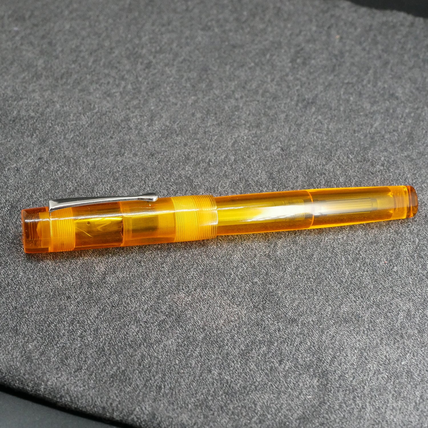 Orville - Medium - Clear orange acrylic - clip - #6 nib