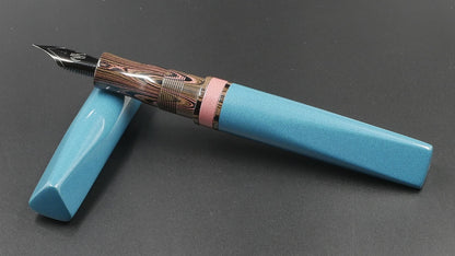 Prospector - Medium - Nikko Light Blue and Pink solid and ripple ebonites - Jowo #6 nib