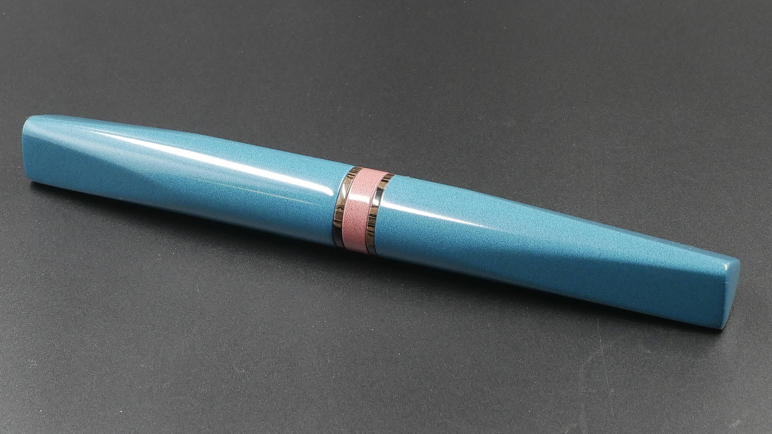 Prospector - Medium - Nikko Light Blue and Pink solid and ripple ebonites - Jowo #6 nib