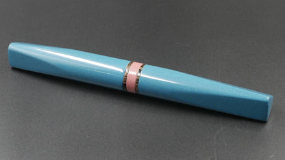 Prospector - Medium - Nikko Light Blue and Pink solid and ripple ebonites - Jowo #6 nib