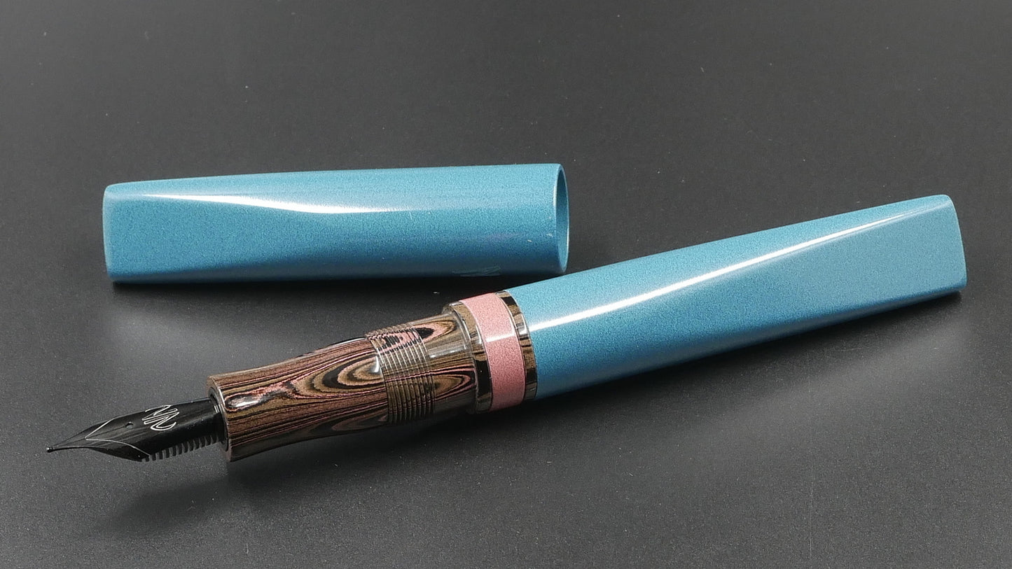 Prospector - Medium - Nikko Light Blue and Pink solid and ripple ebonites - Jowo #6 nib