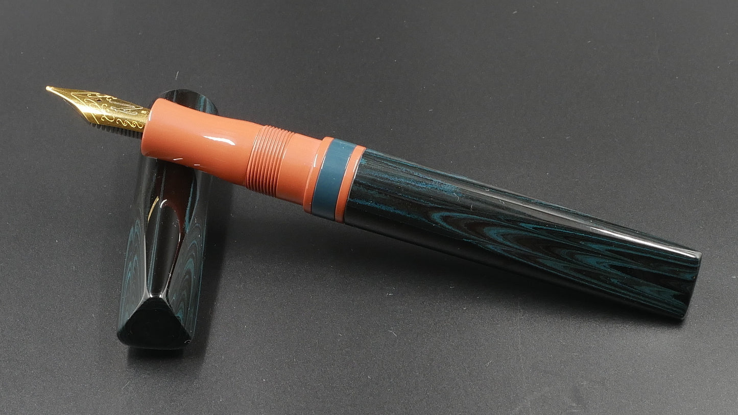Prospector - Medium - SEM Midnight Blue ripple and Cumberland orange ebonites - Jowo #6 nib