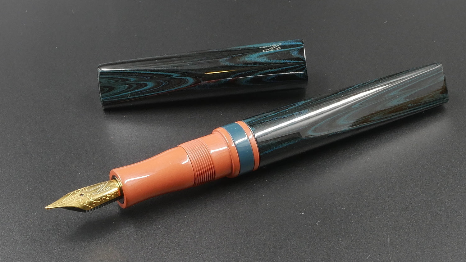 Prospector - Medium - SEM Midnight Blue ripple and Cumberland orange ebonites - Jowo #6 nib