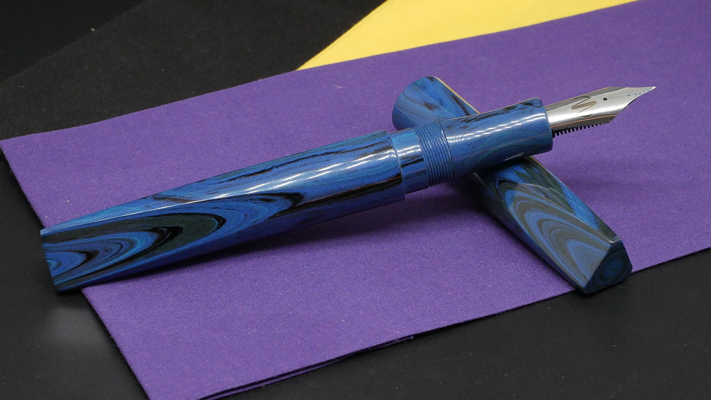 Prospector - Large –  SEM Dark Blues ripple ebonite- #8 nib