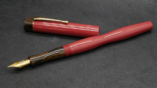 Orville - small - Zaner Bloser style - Red with orange ripple ebonite - clip - #6 nib