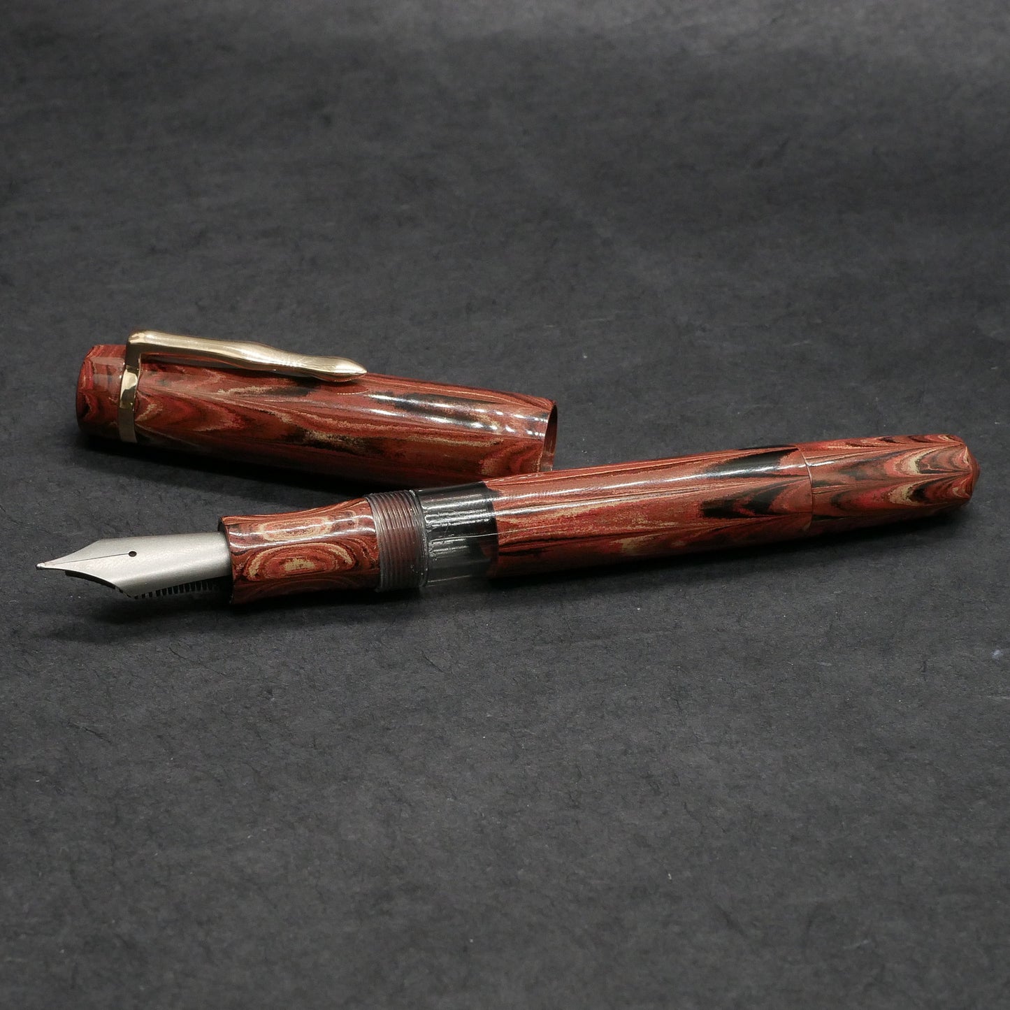 Knickerbocker - Medium - SEM Vesuvius ebonite, gray acrylic window - cast clip - piston - #8 nib