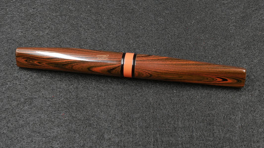 Prospector - Small - Nikko Orange triple ripple and solid black ebonite - Jowo #6 nib