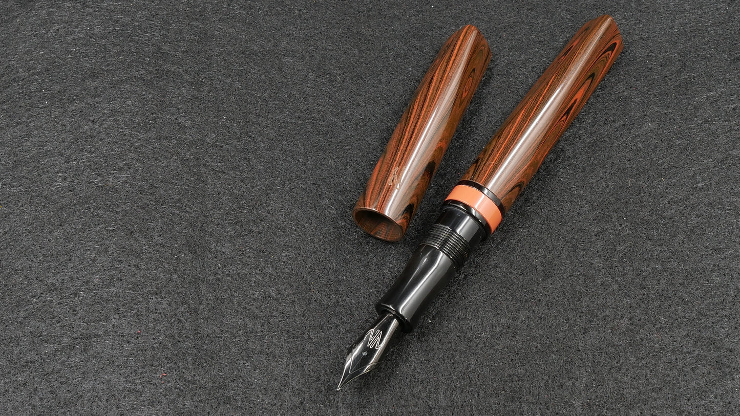 Prospector - Small - Nikko Orange triple ripple and solid black ebonite - Jowo #6 nib