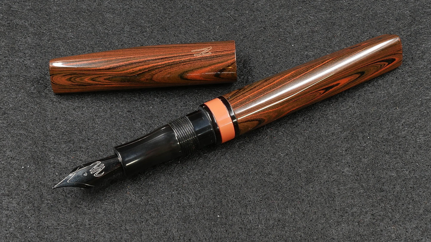 Prospector - Small - Nikko Orange triple ripple and solid black ebonite - Jowo #6 nib