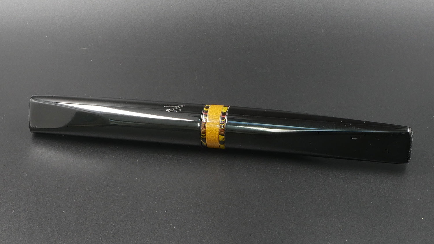 Prospector - Medium - Nikko Autumn lines and Solid black ebonite - Jowo #6 nib