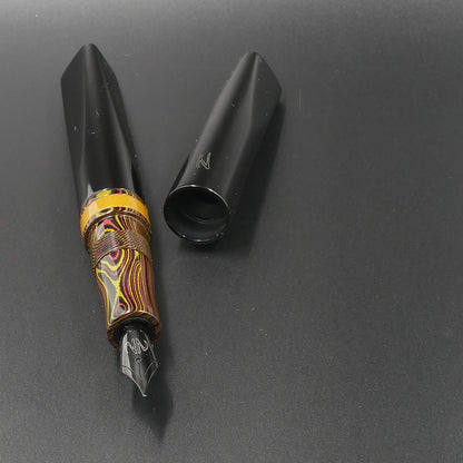 Prospector - Medium - Nikko Autumn lines and Solid black ebonite - Jowo #6 nib