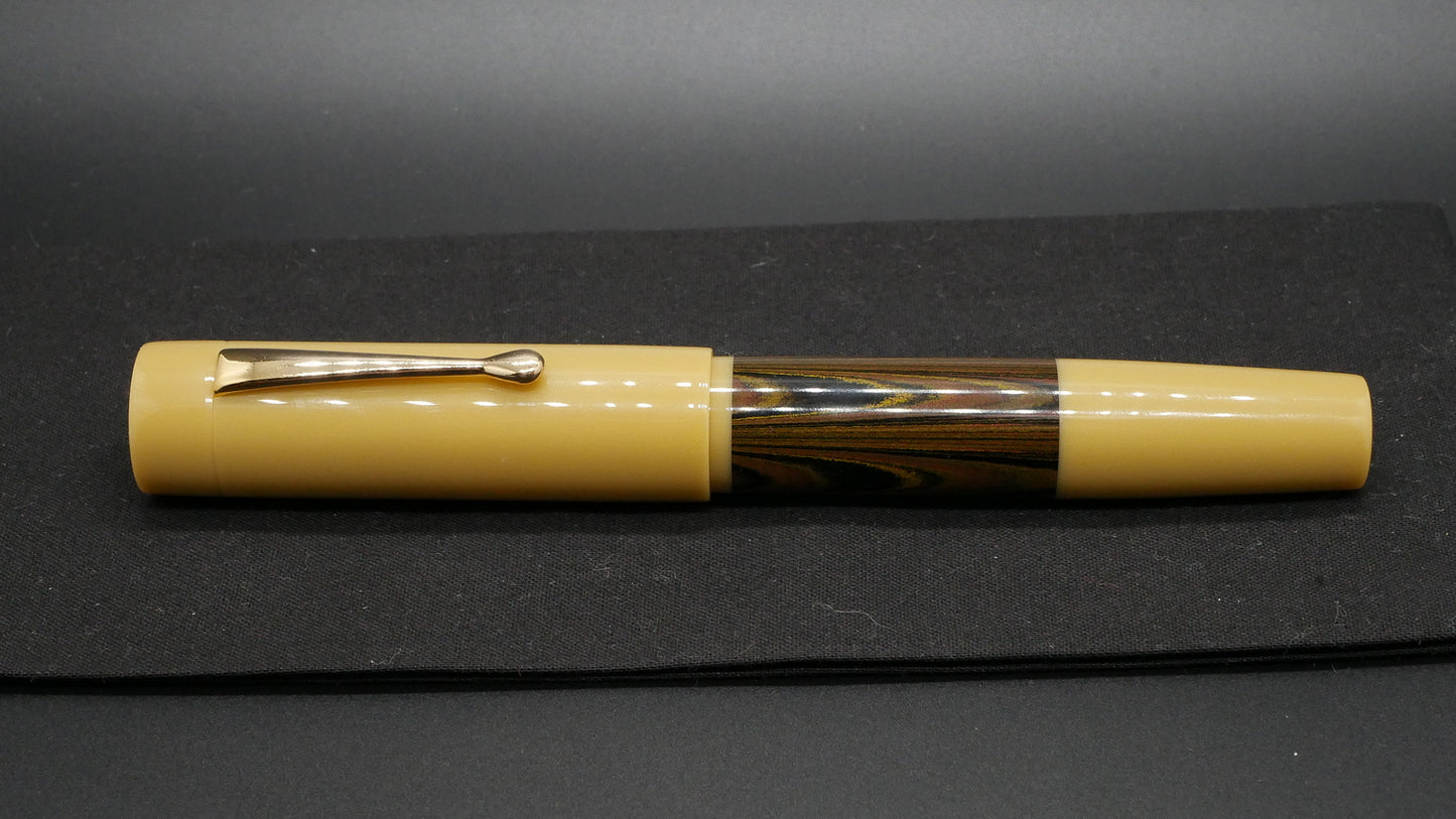 Orville - oversize - Beige and Autumn ripple ebonite, doublet - clip - #6 nib