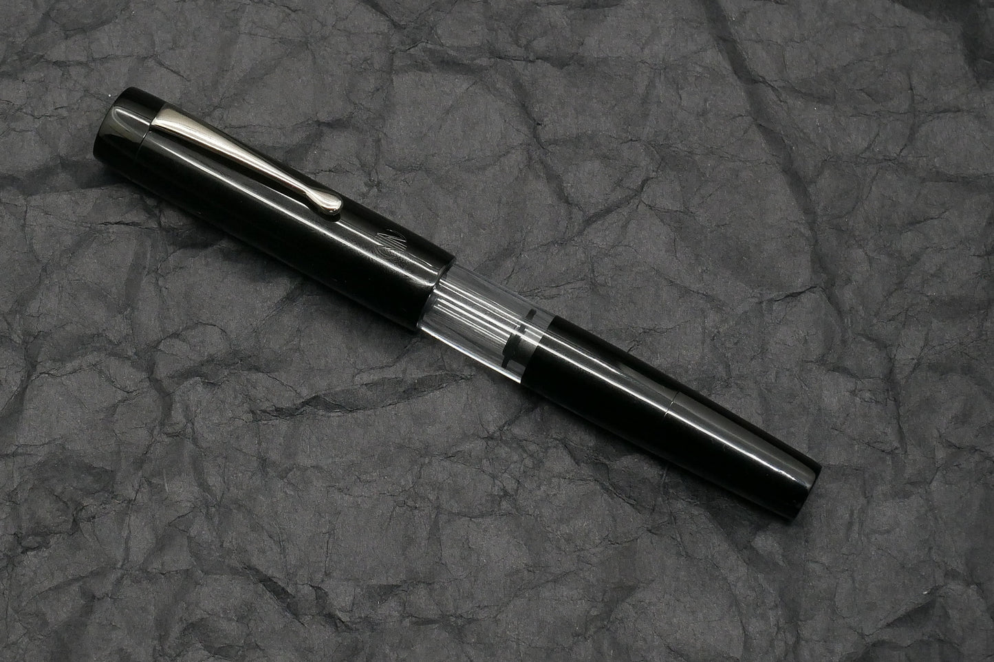 Orville - Medium - Black ebonite, clear acrylic - clip - piston - #6 nib