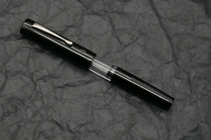 Orville - Medium - Black ebonite, clear acrylic - clip - piston - #6 nib