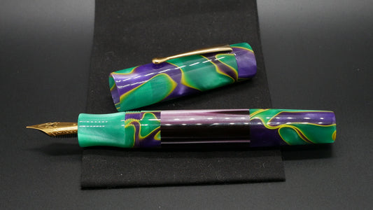 Orville - oversize - Mad Mardi Gras and purple striped acrylic, doublet - clip - #6 nib