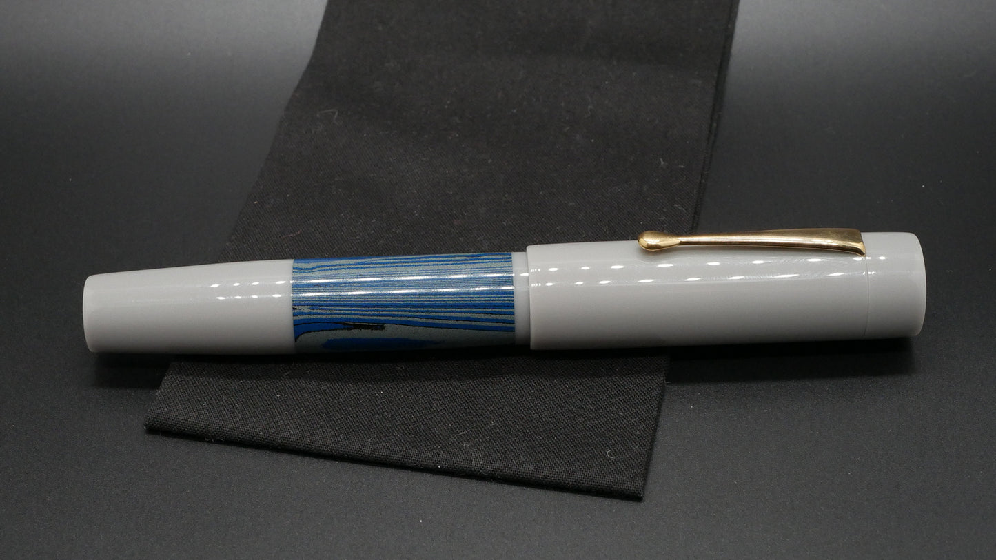 Orville - oversize - Gray and blue layers ebonite, doublet - clip - #6 nib