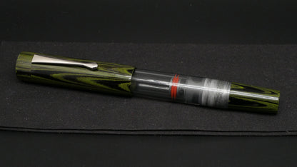 Orville - Large - Nikko green ripple ebonite, clear gray acrylic - clip - piston - #6 nib