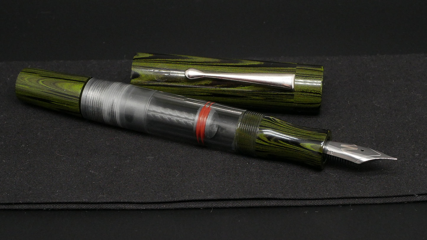 Orville - Large - Nikko green ripple ebonite, clear gray acrylic - clip - piston - #6 nib