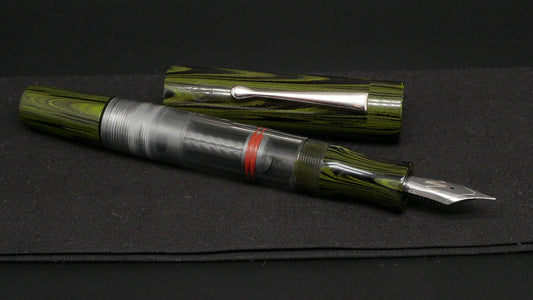 Orville - Large - Nikko green ripple ebonite, clear gray acrylic - clip - piston - #6 nib