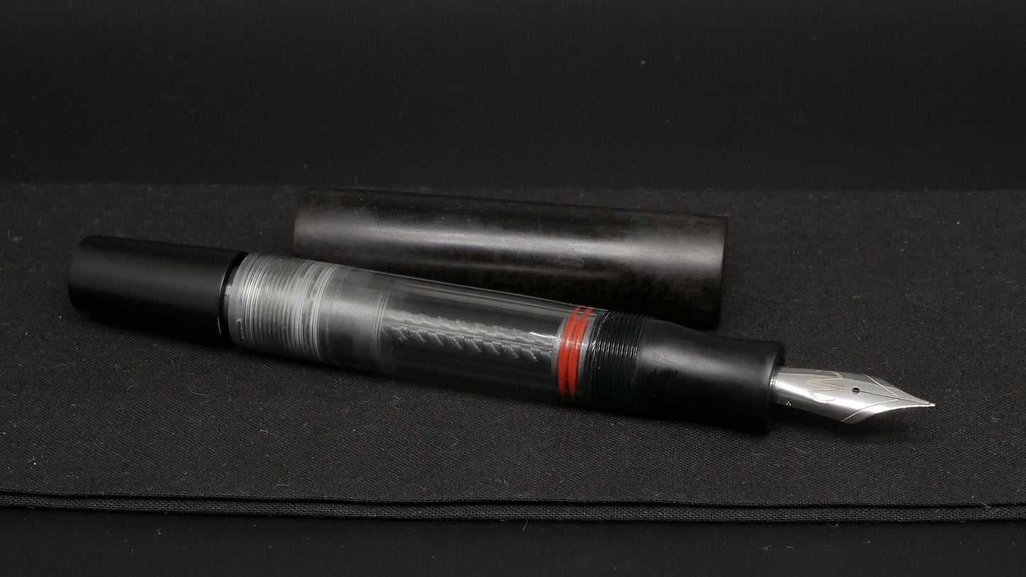 Orville - Large - Leopard spotted black ebonite, clear gray acrylic - piston - #6 nib