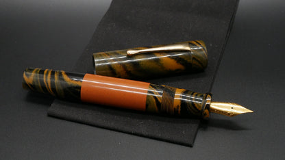 Orville - oversize - Orange swirl and solid ebonite, doublet - clip - #6 nib