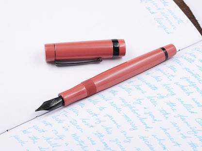 Orville - Small -  SEM Orange and Black ebonites, clip, Jowo #6 nib