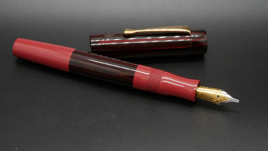 Orville - medium - Nikko Red and SEM Red ripple ebonite, doublet - clip - Jowo #6 nib