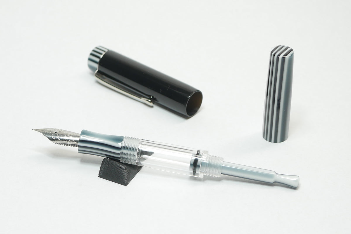 Orville - small - Solid Black and Black pinstripe acrylics - Jowo #6 - Syringe fill