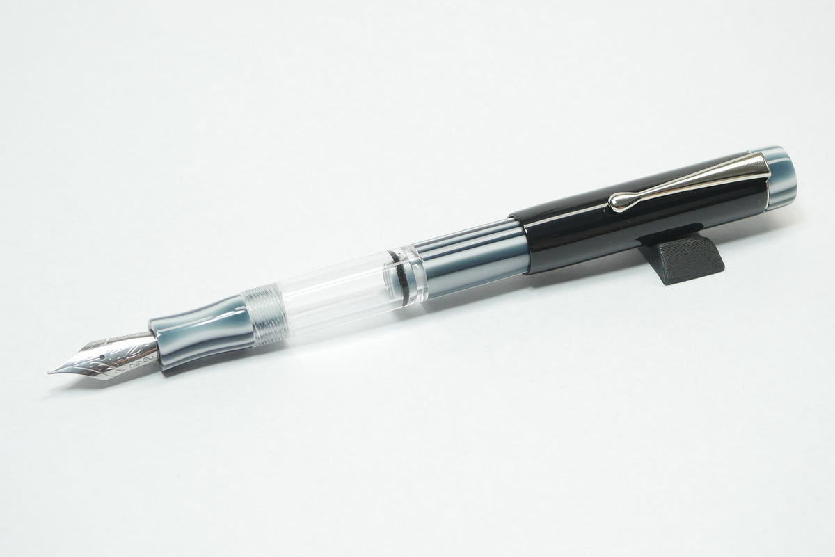 Orville - small - Solid Black and Black pinstripe acrylics - Jowo #6 - Syringe fill