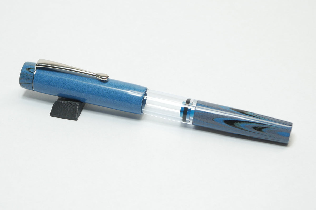 Orville - small - NIKKO Solid and Ripple Light Blue ebonite - Jowo #6 - Syringe fill