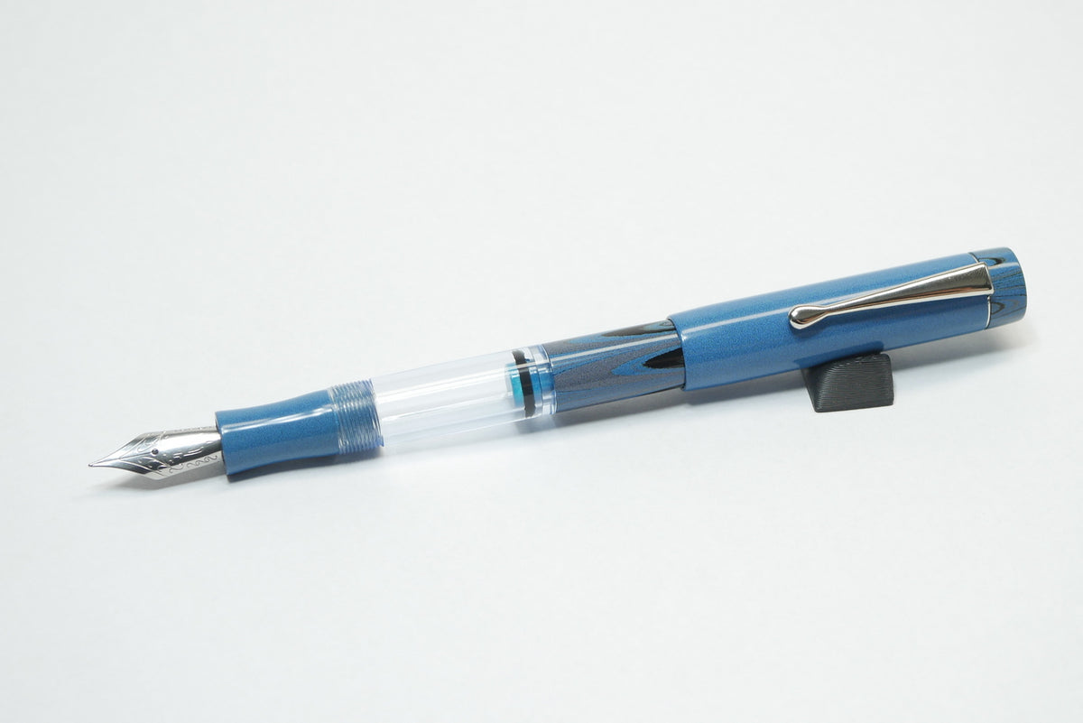Orville - small - NIKKO Solid and Ripple Light Blue ebonite - Jowo #6 - Syringe fill
