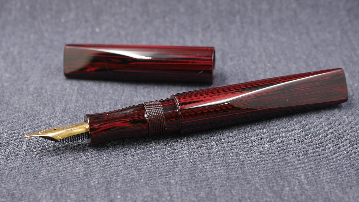 Prospector - Medium - NYH Red woodgrain ebonite - Jowo #6 nib