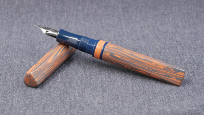 Prospector - Small - NYH Orange/blue gray ripple and blue ebonite - Jowo #6 nib