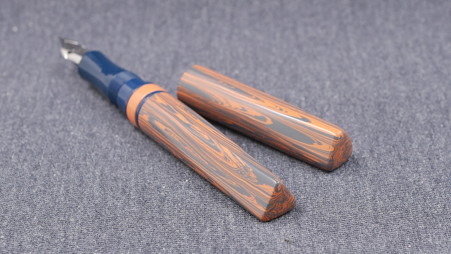 Prospector - Small - NYH Orange/blue gray ripple and blue ebonite - Jowo #6 nib