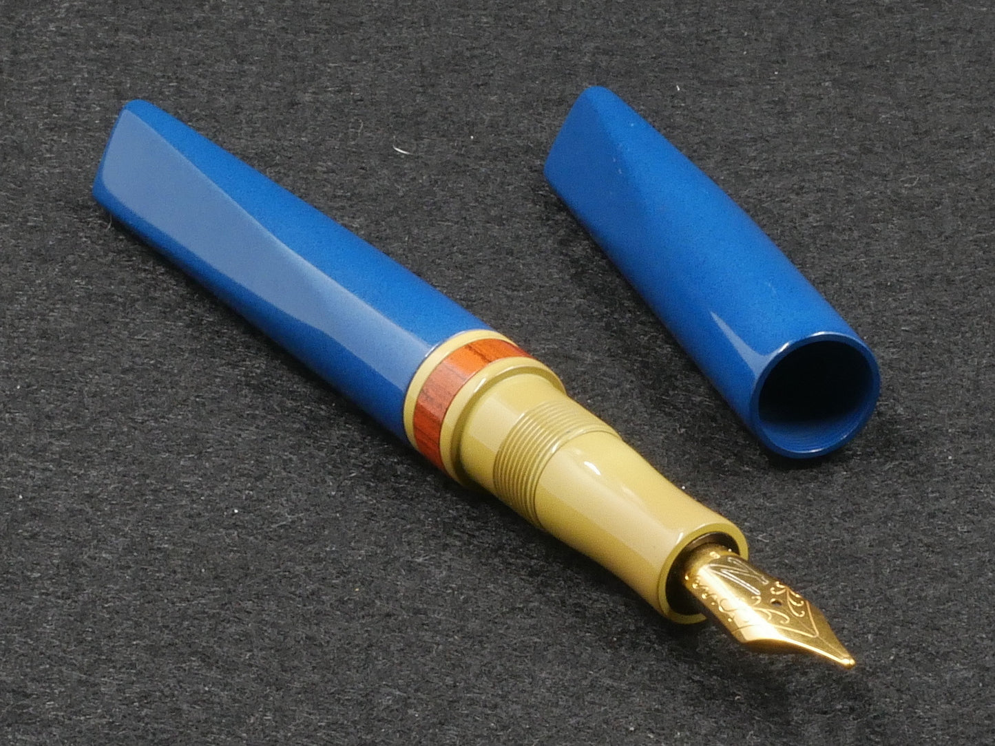 Prospector - Small - Nikko blue, SEM yellow, and NYH orange rippple ebonite - Jowo #6 nib