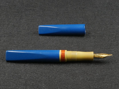 Prospector - Small - Nikko blue, SEM yellow, and NYH orange rippple ebonite - Jowo #6 nib